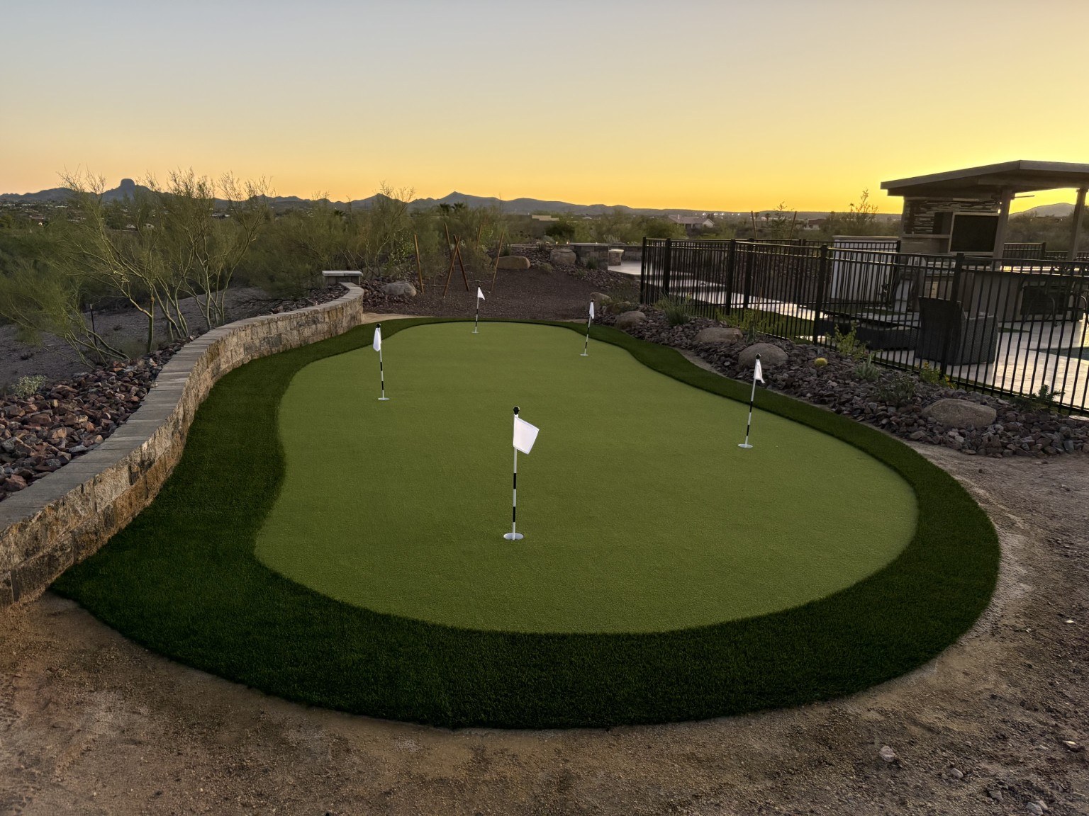 Artificial turf backyard putting green