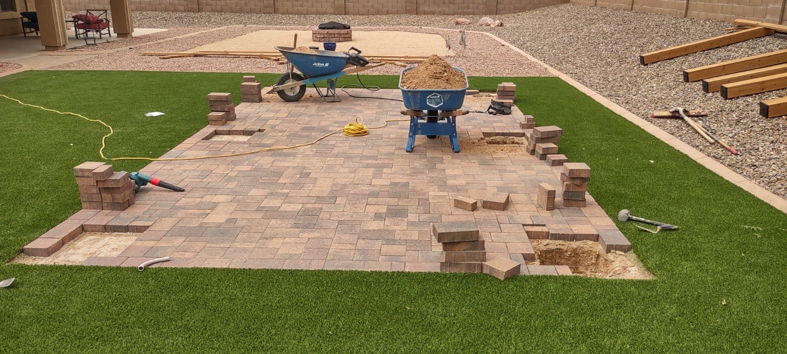 Paver patio installation in progress